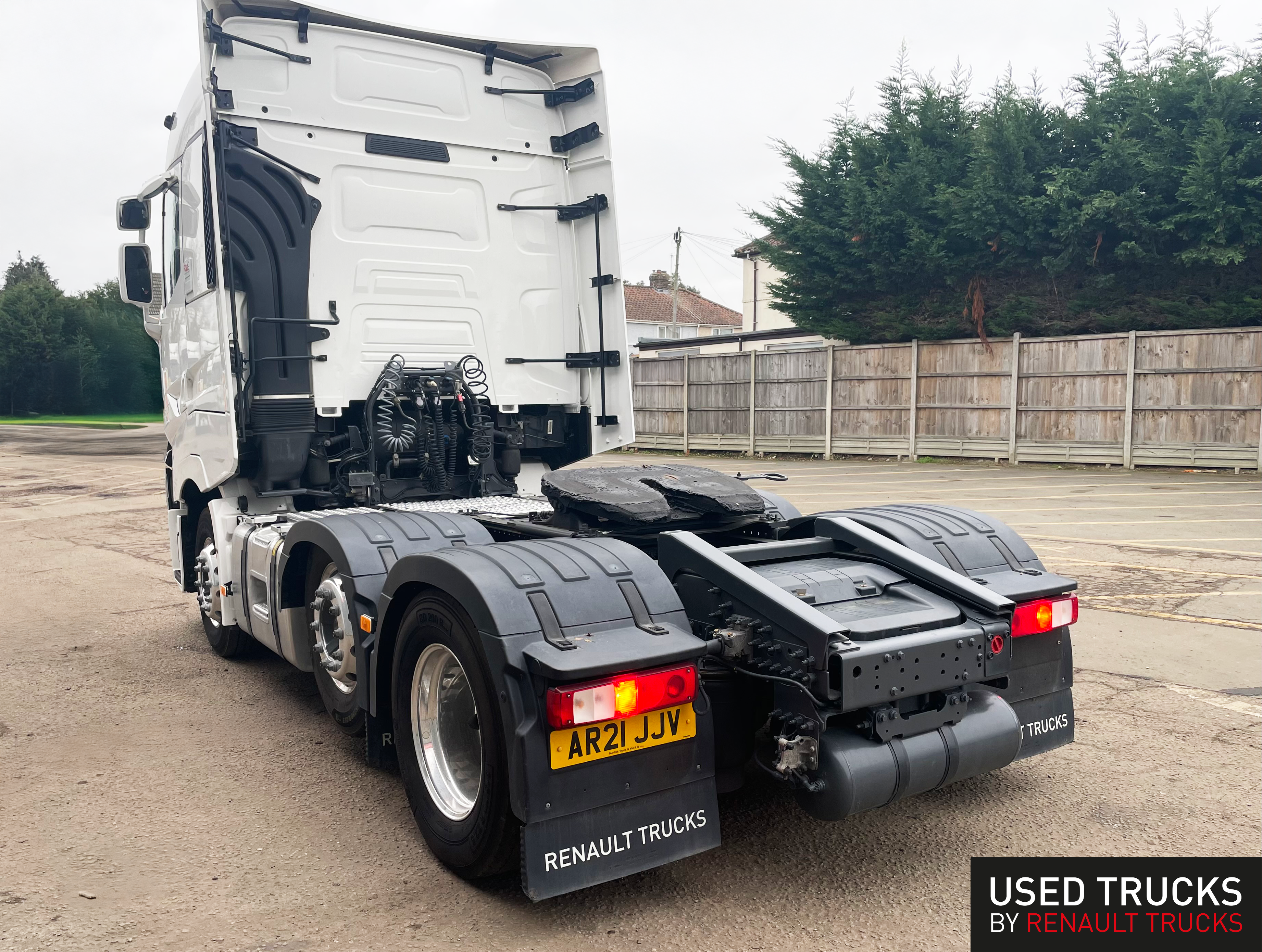 2021 Renault T High tractor unit (AR21 JJV) - rear quarter view showing fifth wheel coupling, chassis installations, and mudguard configuration - side profile at Norfolk Truck & Van dealership - used Renault truck for sale