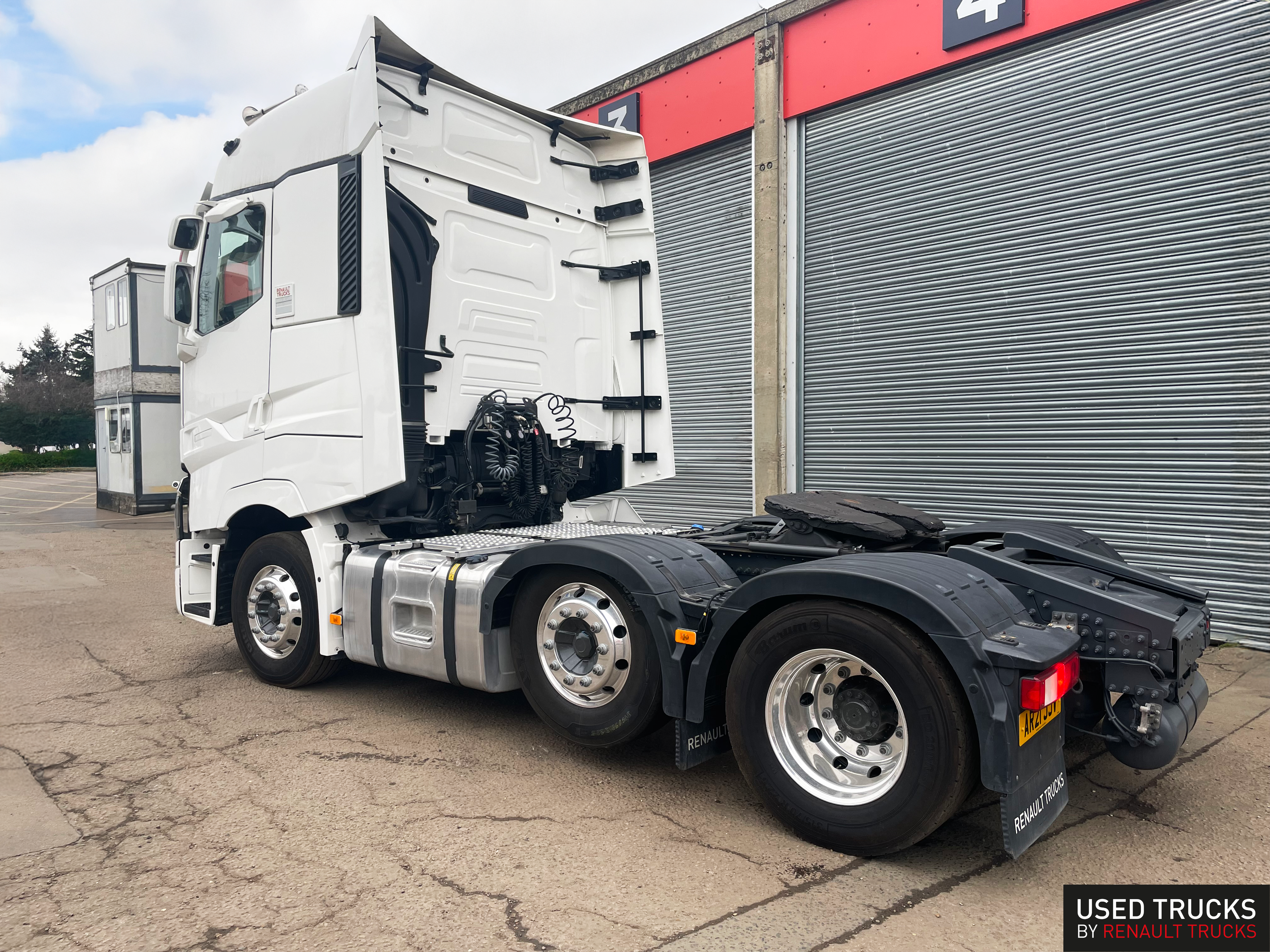 Used 2021 Renault T High 6x2 tractor unit at Norfolk Truck & Van - side profile showing full length, alloy wheels, and white cab with aero kit - premium used truck for sale in dealer stock