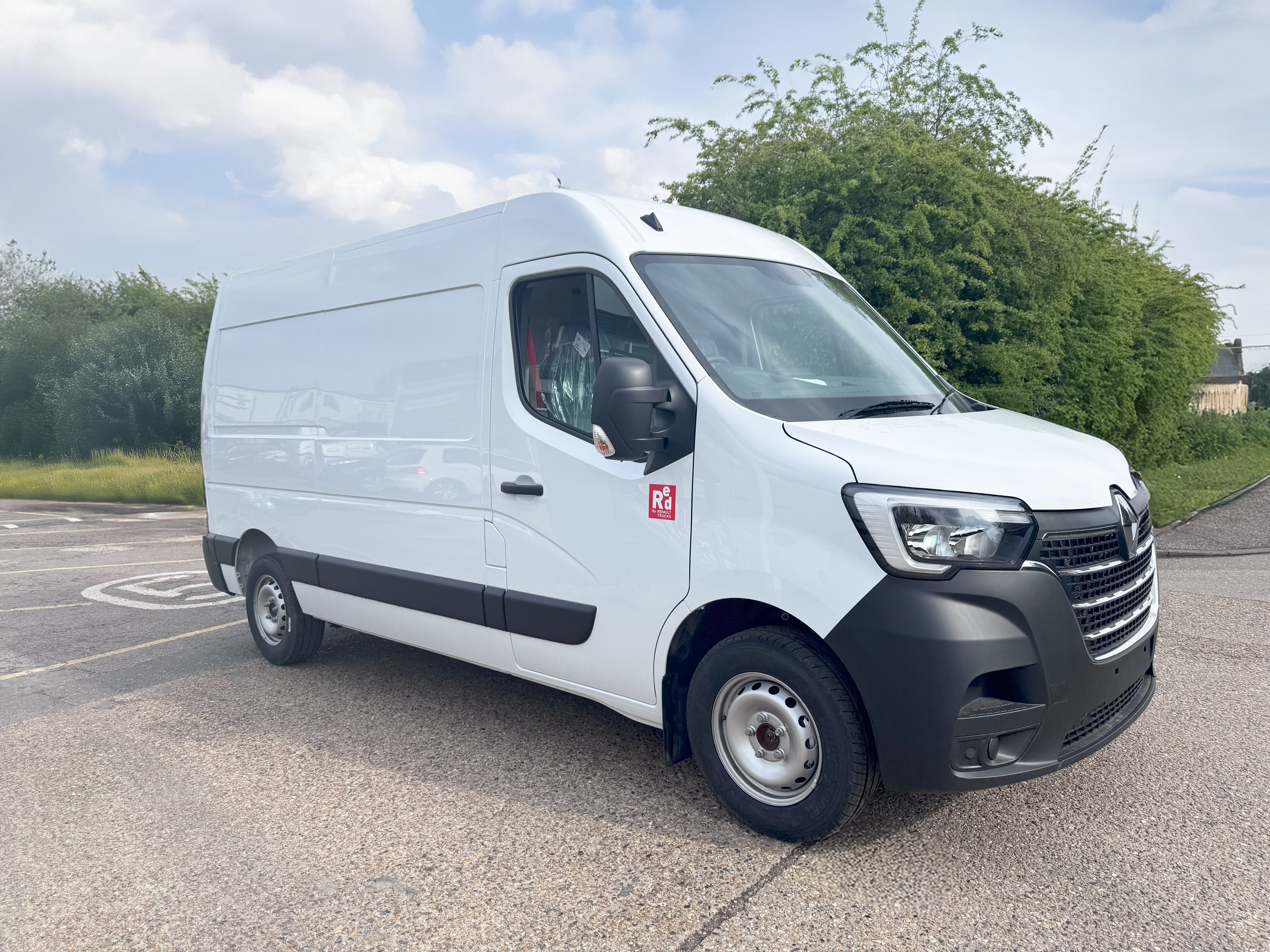 Angled front view of the 2024 Renault Master L2H2 diesel panel van from the driver’s side – available now at Norfolk Truck & Van.
