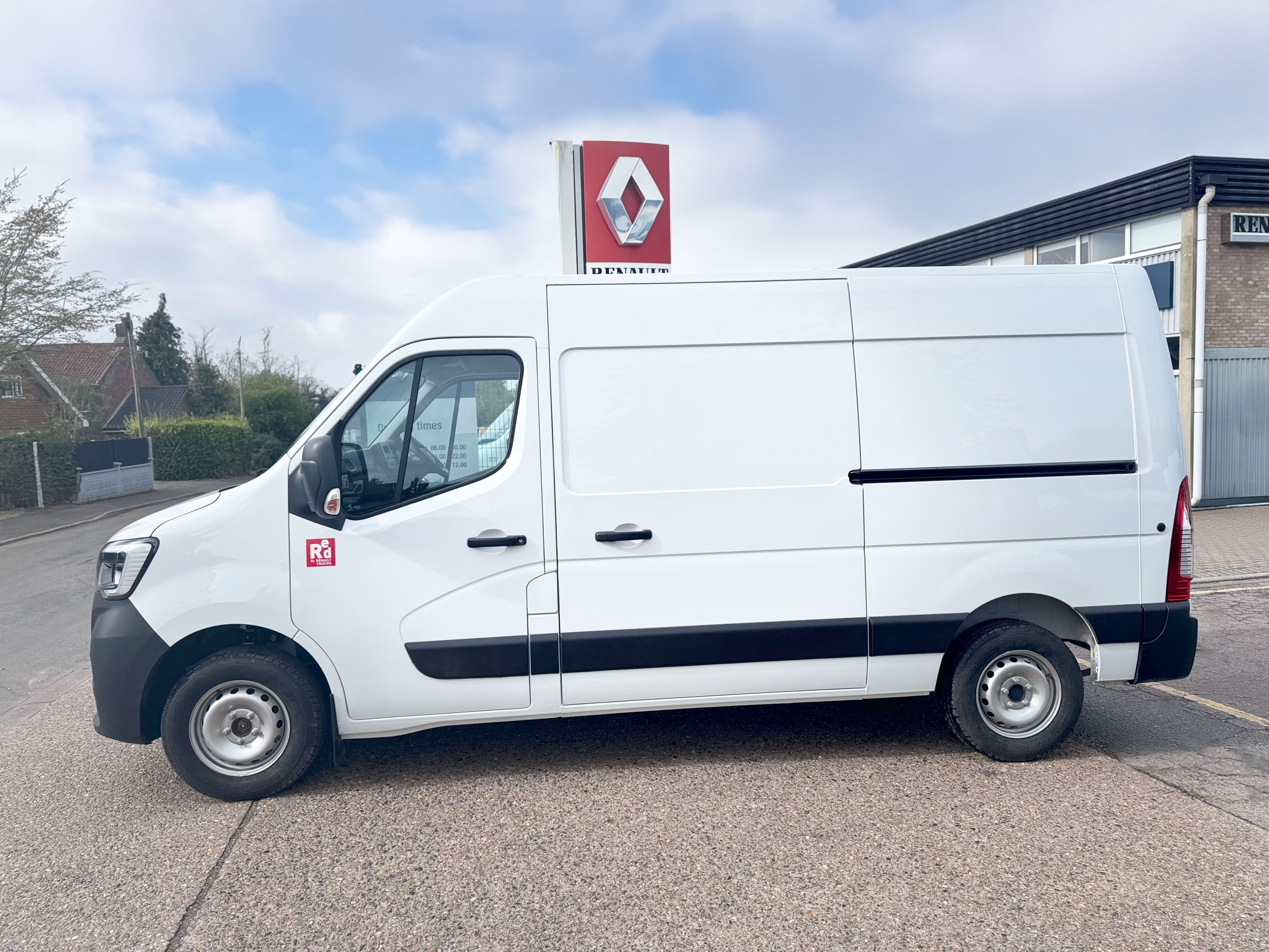 Side profile of the long wheelbase Renault Master L2H2 2024 panel van – ideal for commercial use, available in Norfolk.