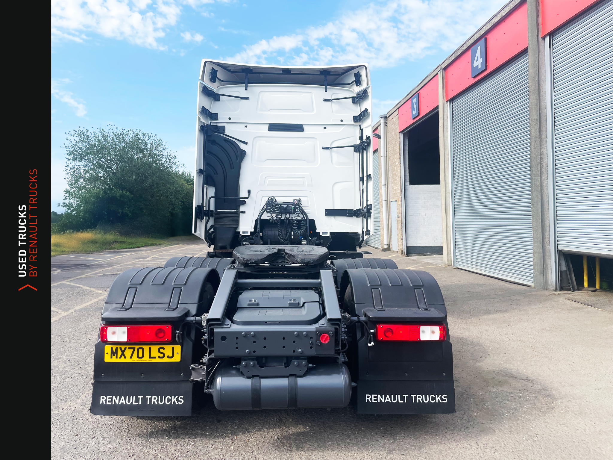 Rear shot of Renault Trucks T 460 Euro 6 with LED brake lights, twin axles and clean chassis lines