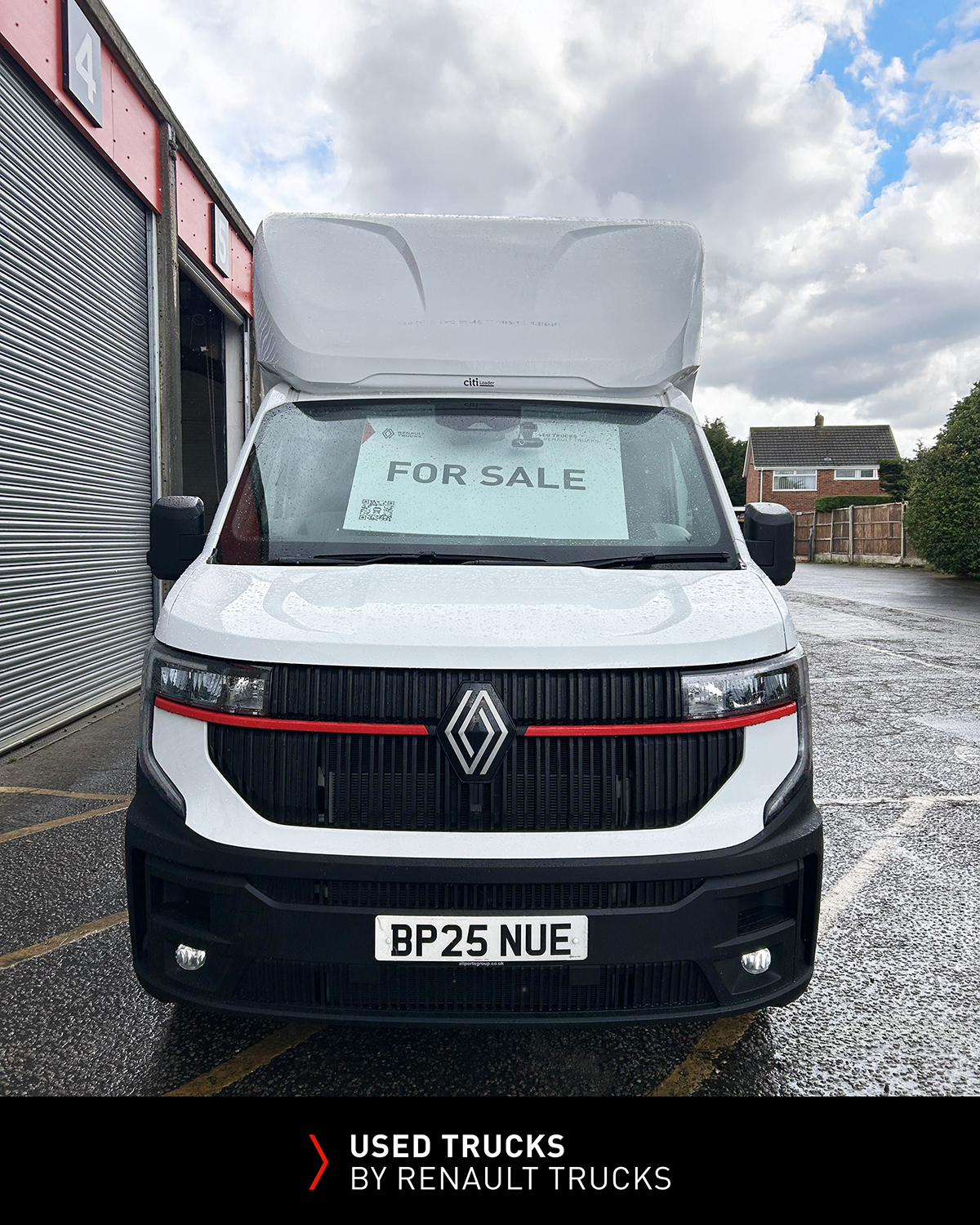Front view of a 2025 Renault Master 150 curtainsider showing grille, headlights and low mileage used vehicle for sale.