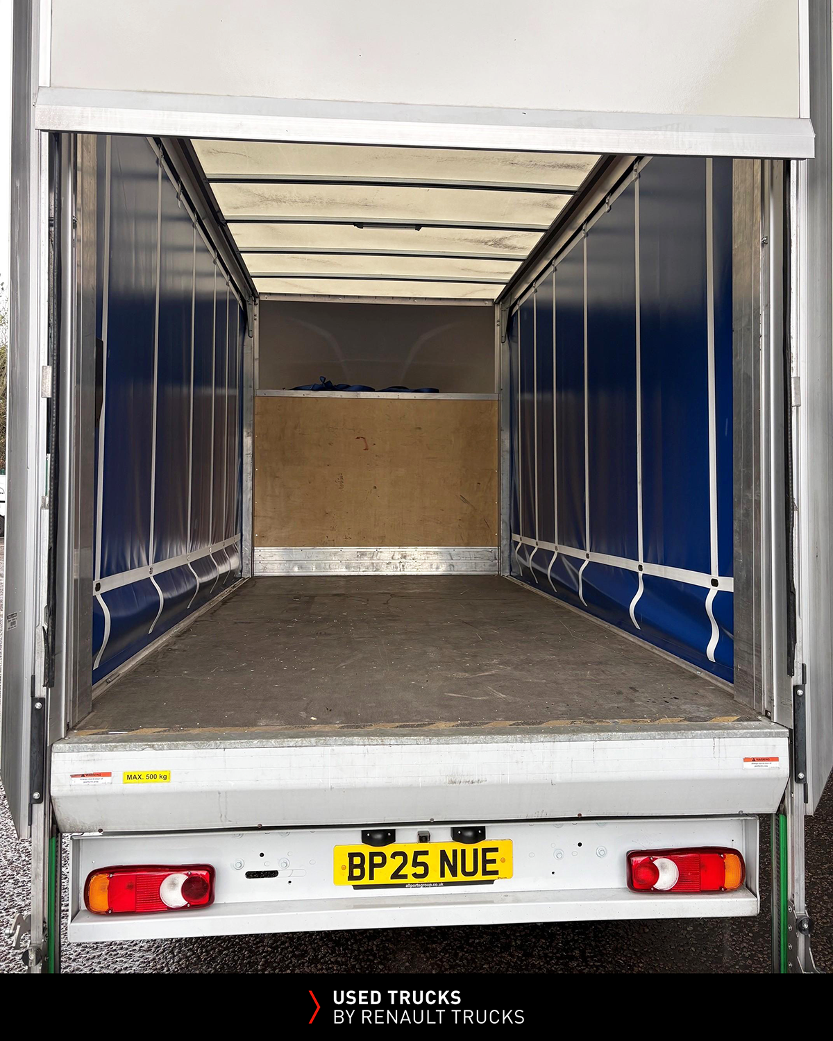 Internal cargo area of Renault Master curtainsider showing spacious load compartment and curtain-sided body.