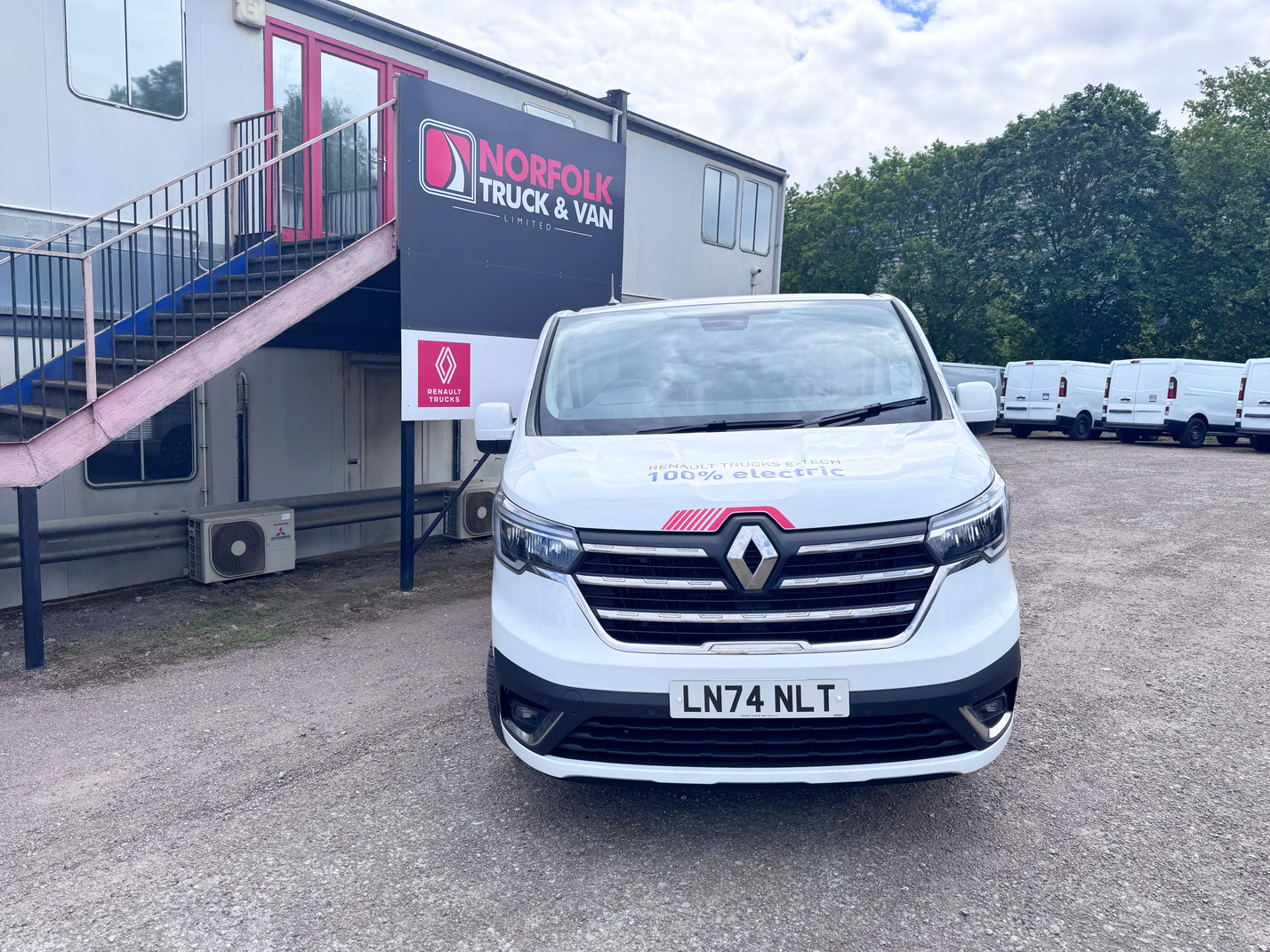 Front view of Renault Trucks E-Tech Trafic Exclusive electric van outside Norfolk Truck & Van dealership
