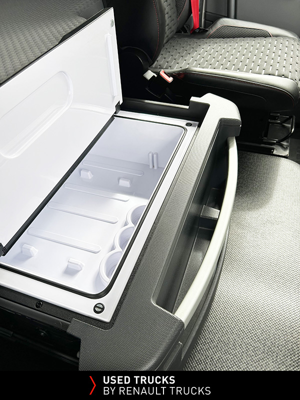 Integrated fridge and storage compartment inside the Renault Trucks T480 sleeper cab.