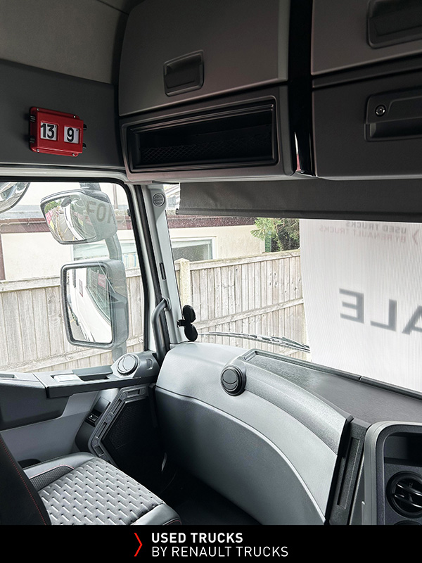 Upper storage lockers and passenger side interior of the Renault Trucks T480 sleeper cab.