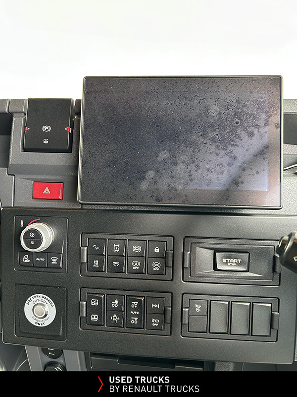 Dashboard controls and multimedia display inside the Renault Trucks T480 cab.