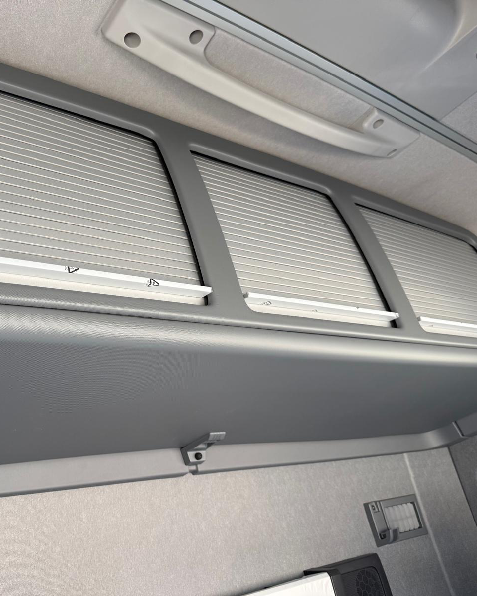 Overhead storage compartments inside Renault Trucks T High 520 sleeper cab