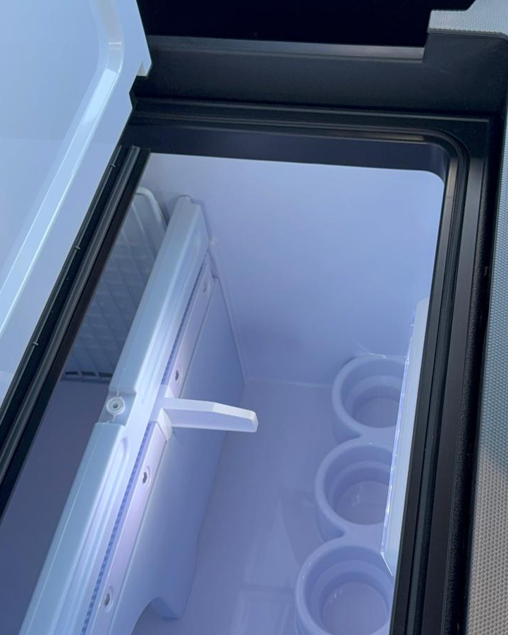 Open refrigerator inside Renault Trucks T High 520 sleeper cab
