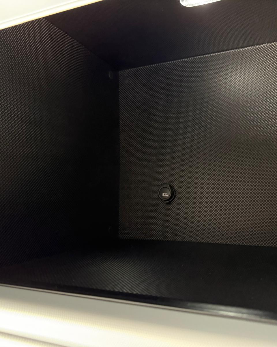 Interior storage compartment with 24V power socket in Renault Trucks T High 520