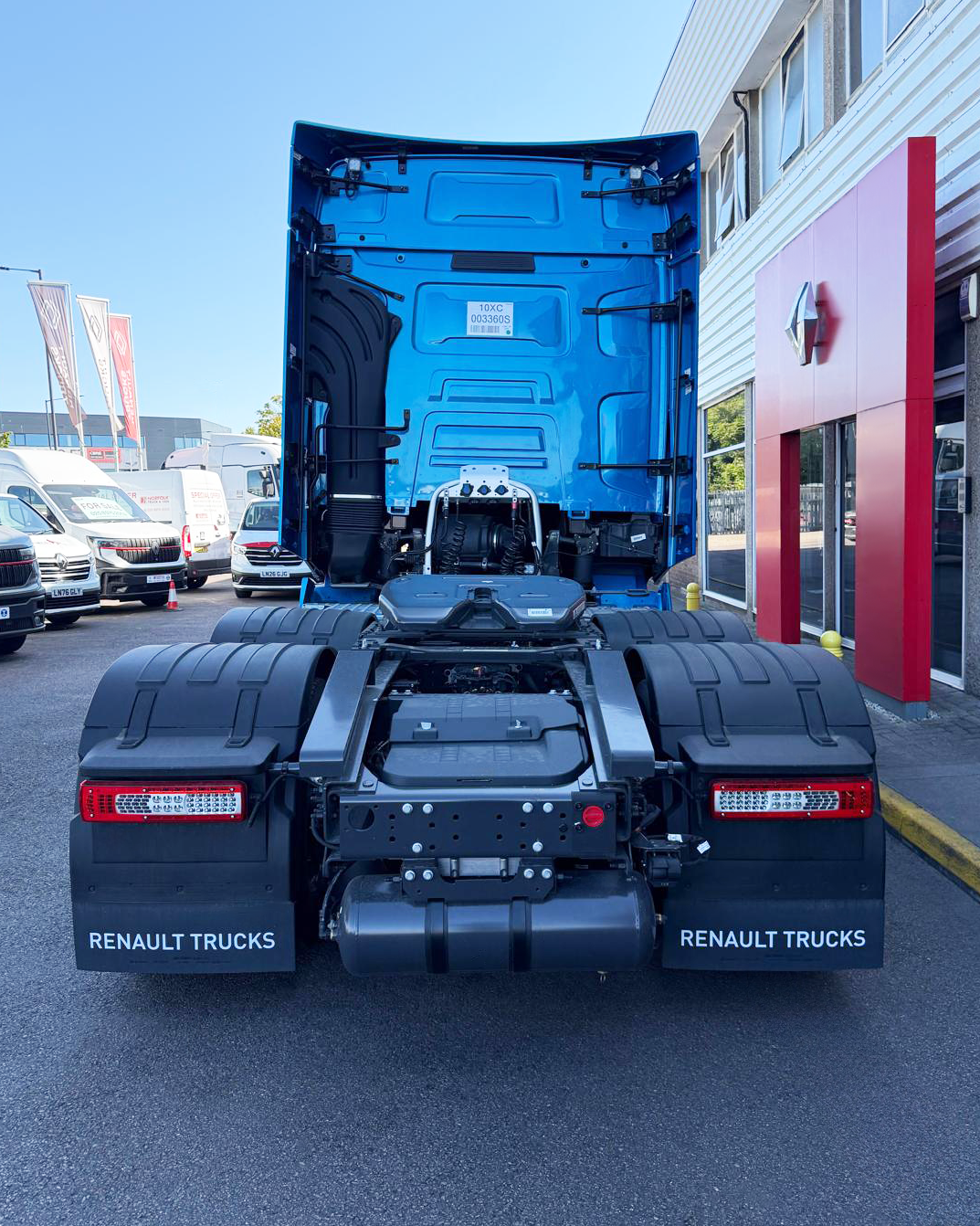 Rear view of Renault Trucks T High 520 6x2 Pusher showing fifth wheel and chassis