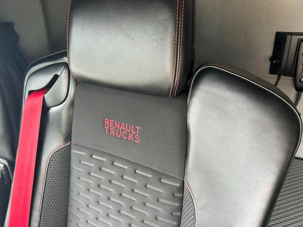 Renault Trucks T480 driver’s seat with red stitching and Renault Trucks branding